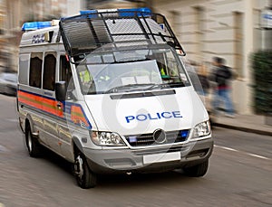 Speeding police van