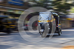 Speeding rickshaw through Mumbai Streets