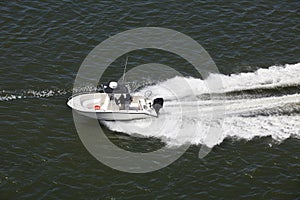 Speeding Sport Fishing Boat