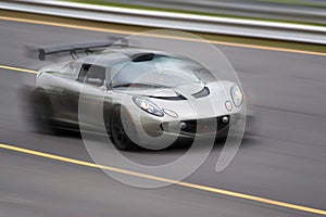 Speeding Sports Car