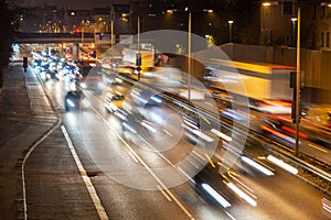 Speeding traffic on a city highway in Munich, Germany. Light trails from long exposure photography.