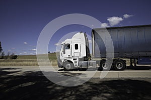 Speeding Truck on a freeway in Country Town midway between Sydney and Melbourne NSW Australia