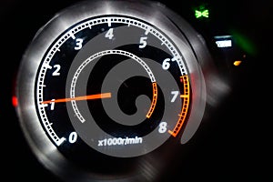 Speedometer on a dark background