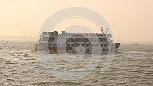 Speedy cruise ship moving to the destination . Silhouette of travel cruise ship at deep sea