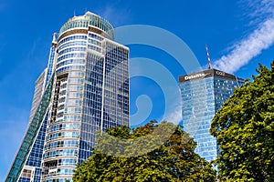 Spektrum Tower office skyscraper at 18 Twarda street and Q22 office tower in Srodmiescie business district in Warsaw, Poland