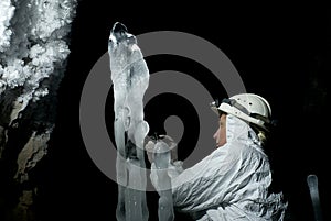 Speleologist in the ice cave