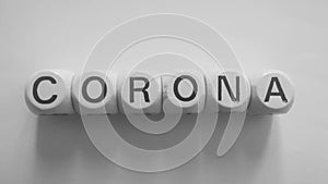 Spelling of corona using wooden dice