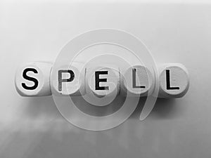 Spelling of spell using wooden dice
