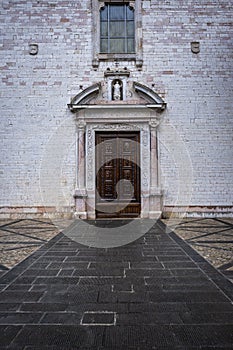 Spello, Italy: old palace entry door. Color image