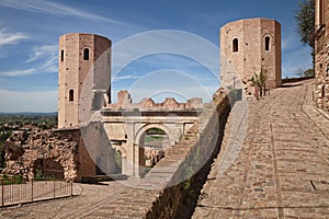 Spello, Perugia, Umbria, Italy: Porta Venere, 2000 years old, the Roman city gate of the ancient town and the towers photo