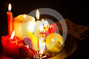 Spells omens and magic abstract background with candles in night