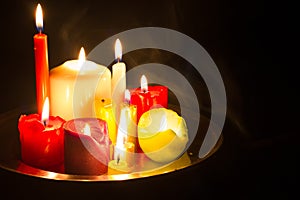Spells omens and magic abstract background with candles in night