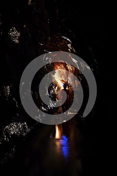 Spelunker exploring a cave