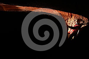 Spelunker exploring a cave