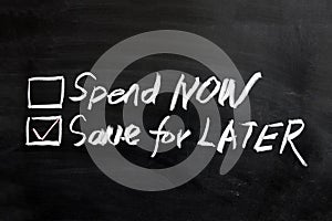 Spend now or save for later photo