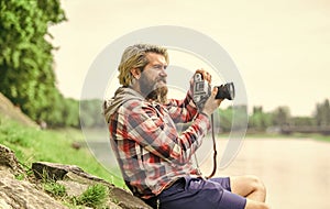 Spending carefree time. hipster man with beard use professional camera. photographer retro camera. journalist is my