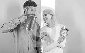 Spending good morning together. Prepare favourite drink in minutes. Modern devices make our life easier. Couple prepare