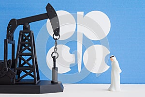 Spending or investment of a country revenues from petroleum exports industry Petrodollar. Oil pump jack and arab men with OPE