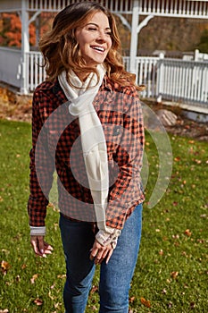 Spending some time in the autumn air. an attractive young woman in the park during autumn.