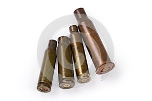 Spent shells different calibers from assault rifles on white background