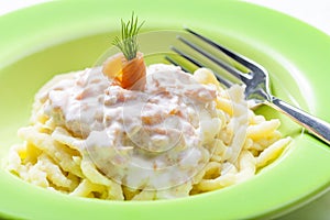 spetzle with sauce of smoked salmon photo
