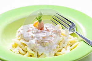 spetzle with sauce of smoked salmon photo