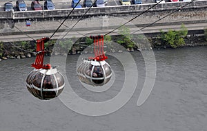 Sphere cable cars over the river IsÃ¨re