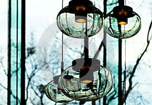 Sphere shaped glass designer light fixtures in closeup view.