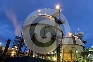 Spheres gas storage in petrochemical plant at twilight