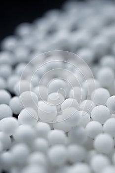 Spherical homeopathic pills closeup