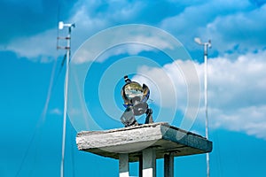 Spherical meteorological sunshine recorder heliograph at the weather station against the sky photo