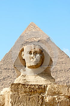 Sphinx on the background of great pyramid