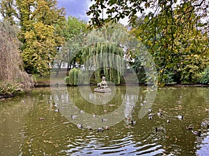 Sphinx pond in Duchcov city. Czech Republic. There are ducks swimming in the pond.
