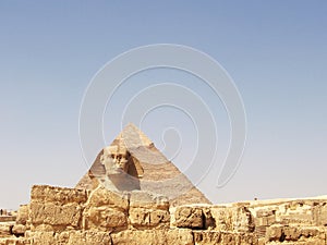 The Sphinx and pyramid in Egypt. Mysterious ancient landscape.