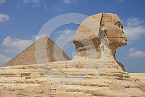 Sphinx and Pyramid of pharaoh Cheops. Giza in Egypt.