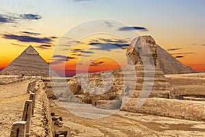 The Sphinx and the Pyramids at sunset, beautiful view, Giza, Egypt