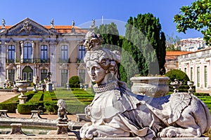 Sphinx sculpture at the Neptune gardens and Cerimonial Facade on the Queluz Royal Palace. photo