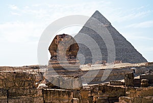 Sphinx statue and Cheops pyramid in Giza Egypt