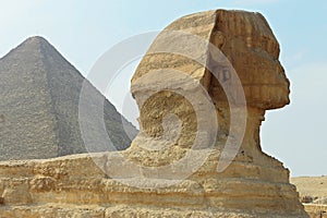 Sphinx statue and Pyramid in Giza Egypt. Ancient architecture