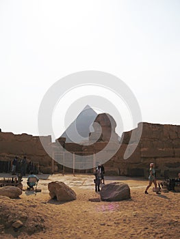 Sphinx statue and pyramid in Giza Egypt. Ancient architecture