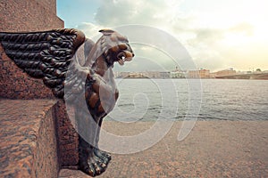 Sphinxes and Griphon in St. Petersburg. Panorama of Petersburg under a blue sky with clouds