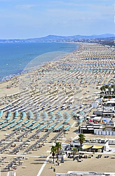 Spiaggia di Rimini con ombrelloni photo
