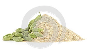 Spice green cardamom powder and whole capsules isolated on white background. Ground cardamom and cardamom pods. Elaichi