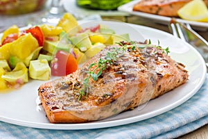 Spice grilled salmon with mango-avocado salsa