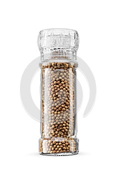 Spice grinder. Dried coriander mill isolated on a white background