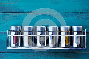 Spice rack on a wooden wall