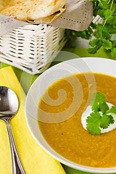 Spiced Carrot and Lentil soup with spoon