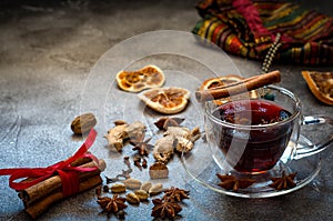 Spiced hot red wine in a transparent cup