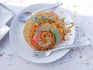 Spiced rice in a plate. Indian cuisine
