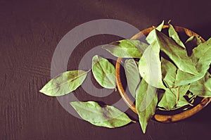 Spices of bay leaf in rural style/bay leaf in a wooden bowl on a